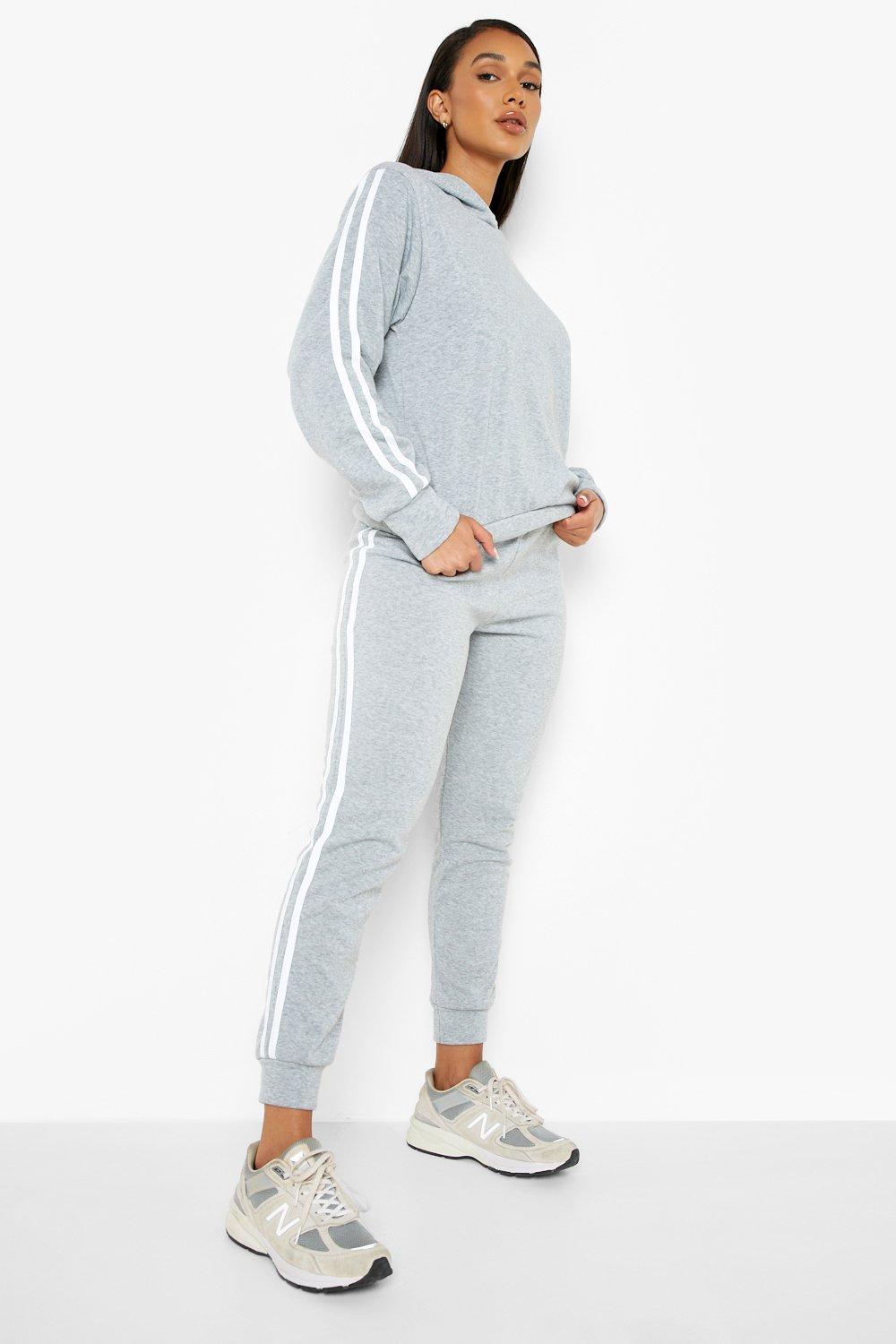 Tracksuit with cheap stripe down side